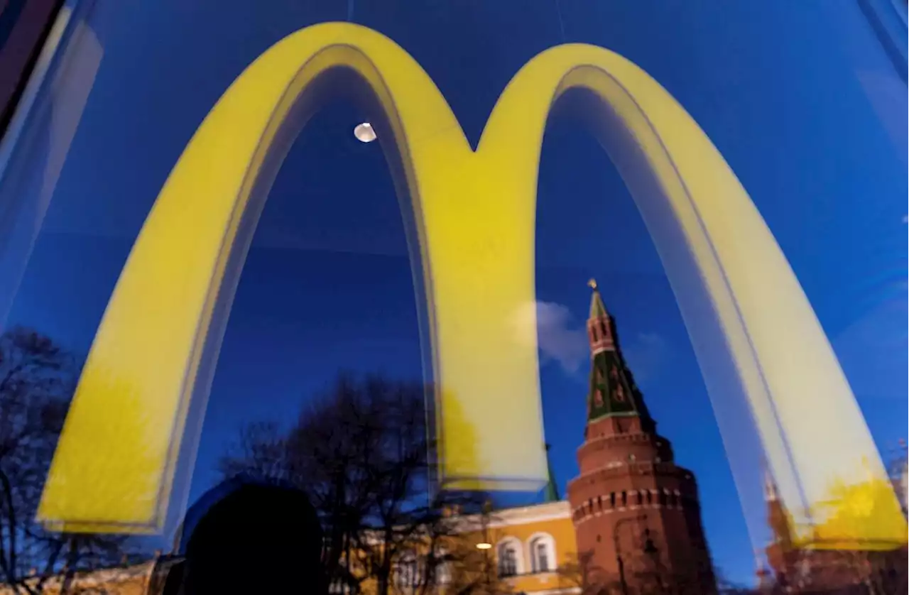 REFILE-UPDATE 4-Golden arches to go dark in Russia as McDonald's exits after 30 years