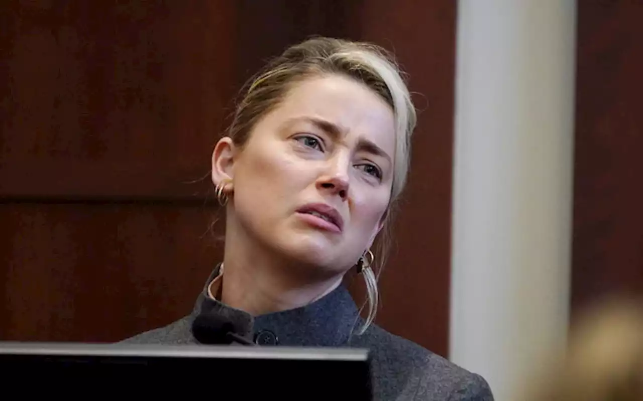 Amber Heard says trial is 'torture,' wants to 'move on'