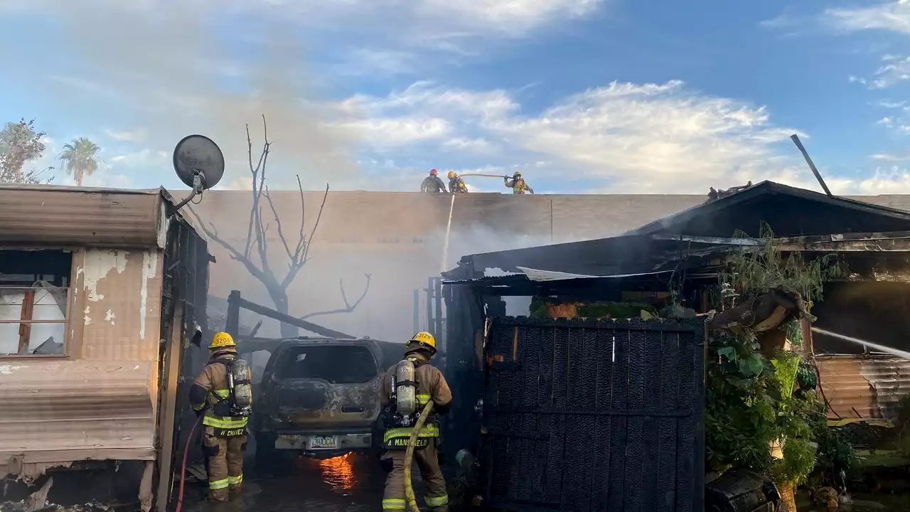 Double mobile home fire in Phoenix leaves 10 residents displaced