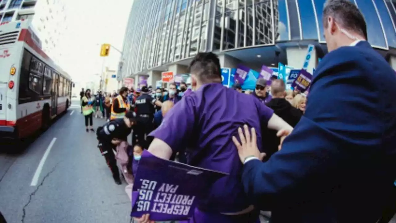 Nurse pushed to ground as Doug Ford arrived at Toronto debate, union says