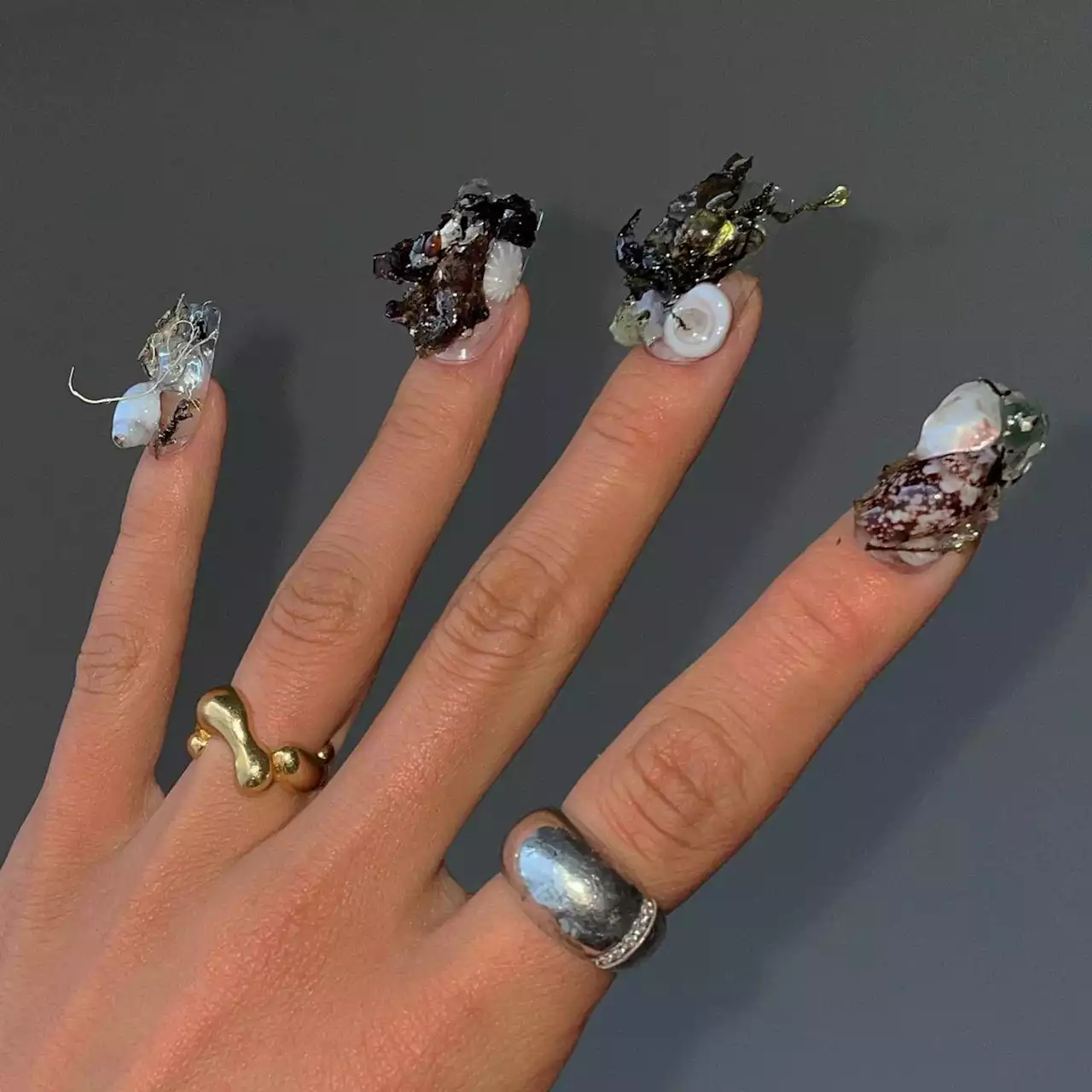 The nail artist creating surreal glass nails for Hunter Schafer and Grimes