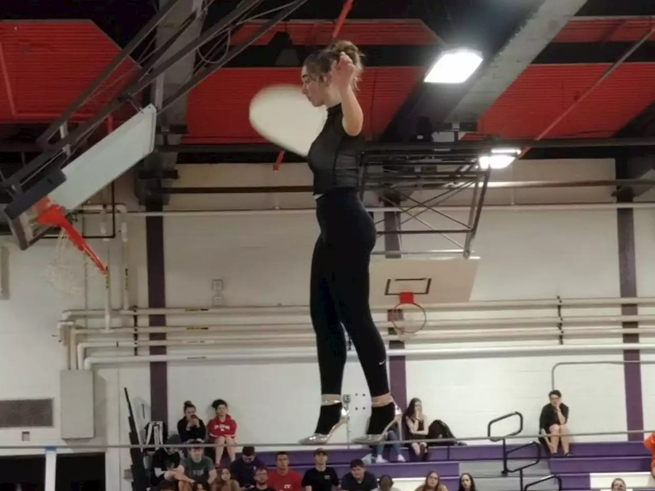 Vermont teen shatters world record for tightrope walk in high heels