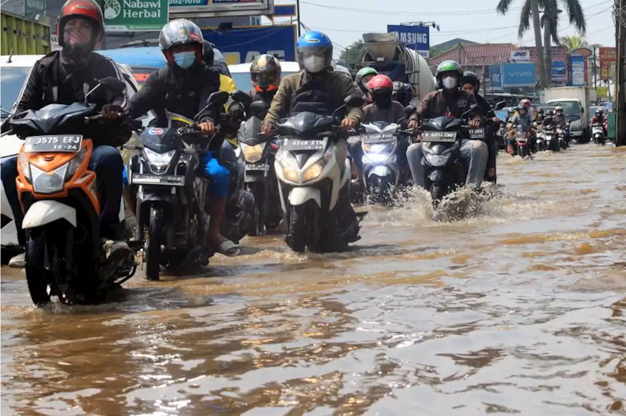 Banjir di Jalan Raya Sawangan Depok |Republika Online