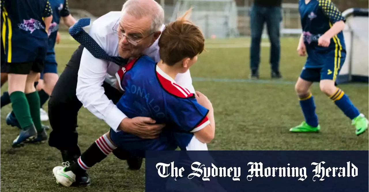 Campaign goes off script as Morrison accidentally tackles little Luca