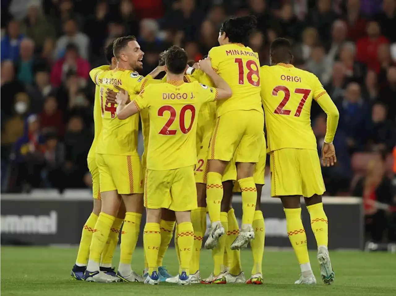 Soccer-Liverpool take title race down to the wire with win at Southampton