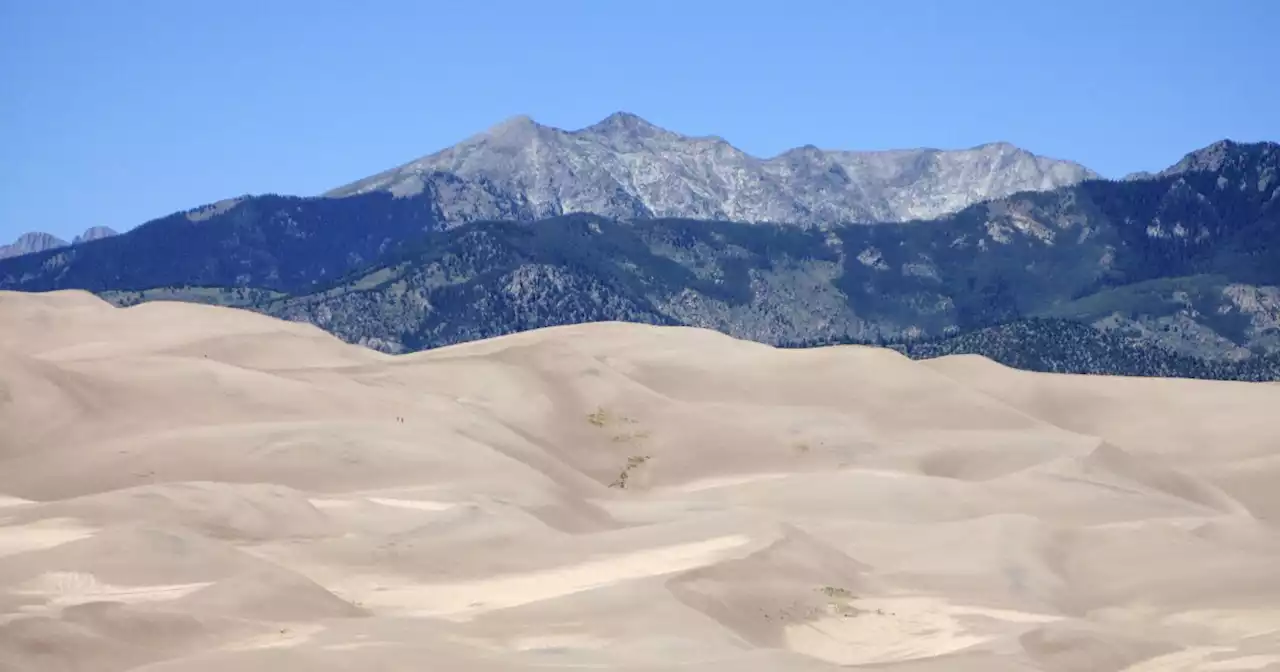 Fire sparks along entrance road to Great Sand Dunes National Park