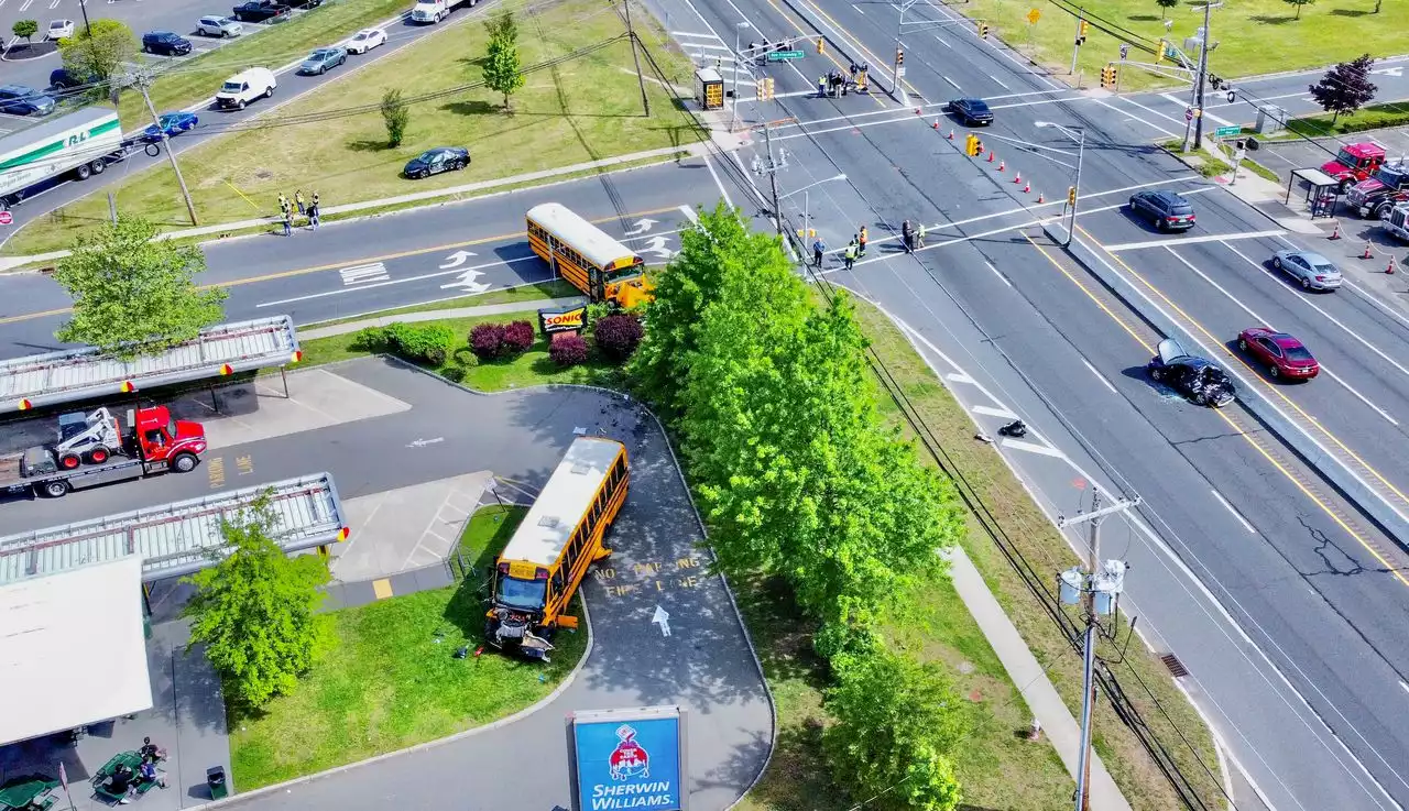 Police investigating 4-vehicle crash involving 2 school buses in Howell