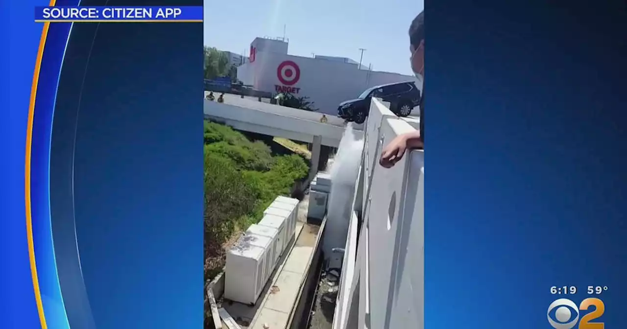 SUV nearly drives off edge of Culver City mall parking structure, sends geyser of water flying