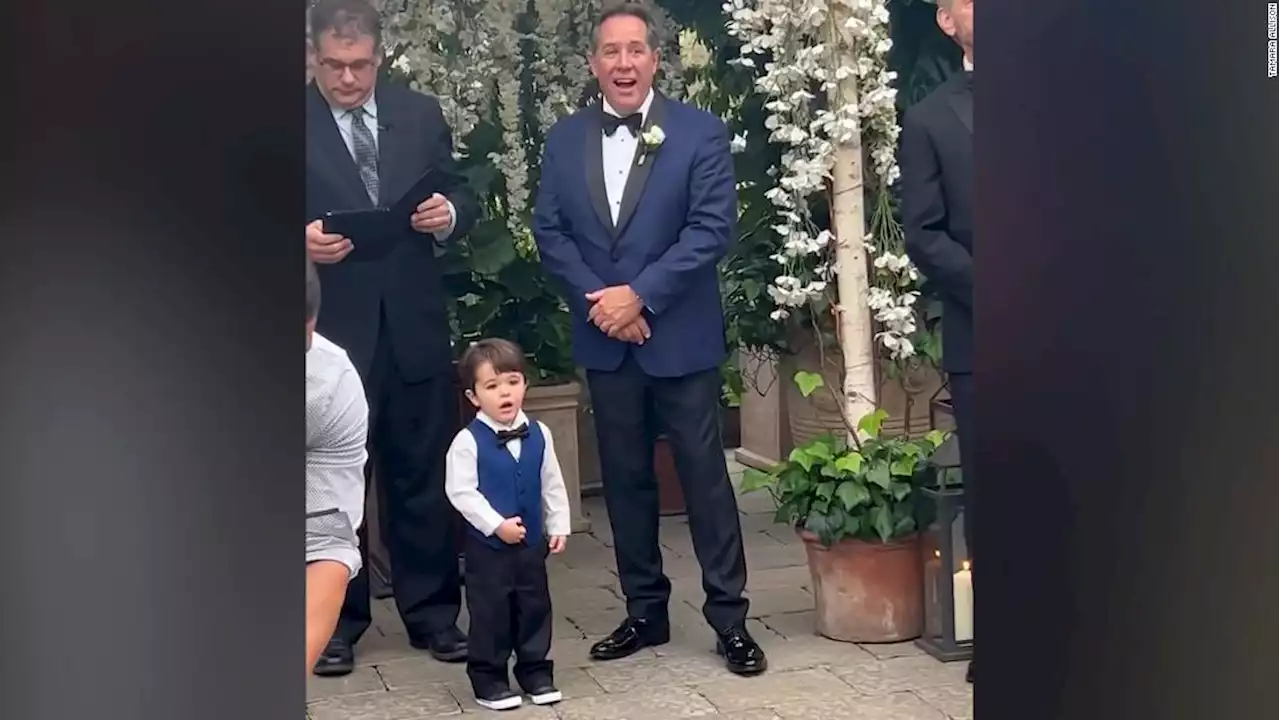 Watch this adorable toddler steal the show at his parents' wedding - CNN Video