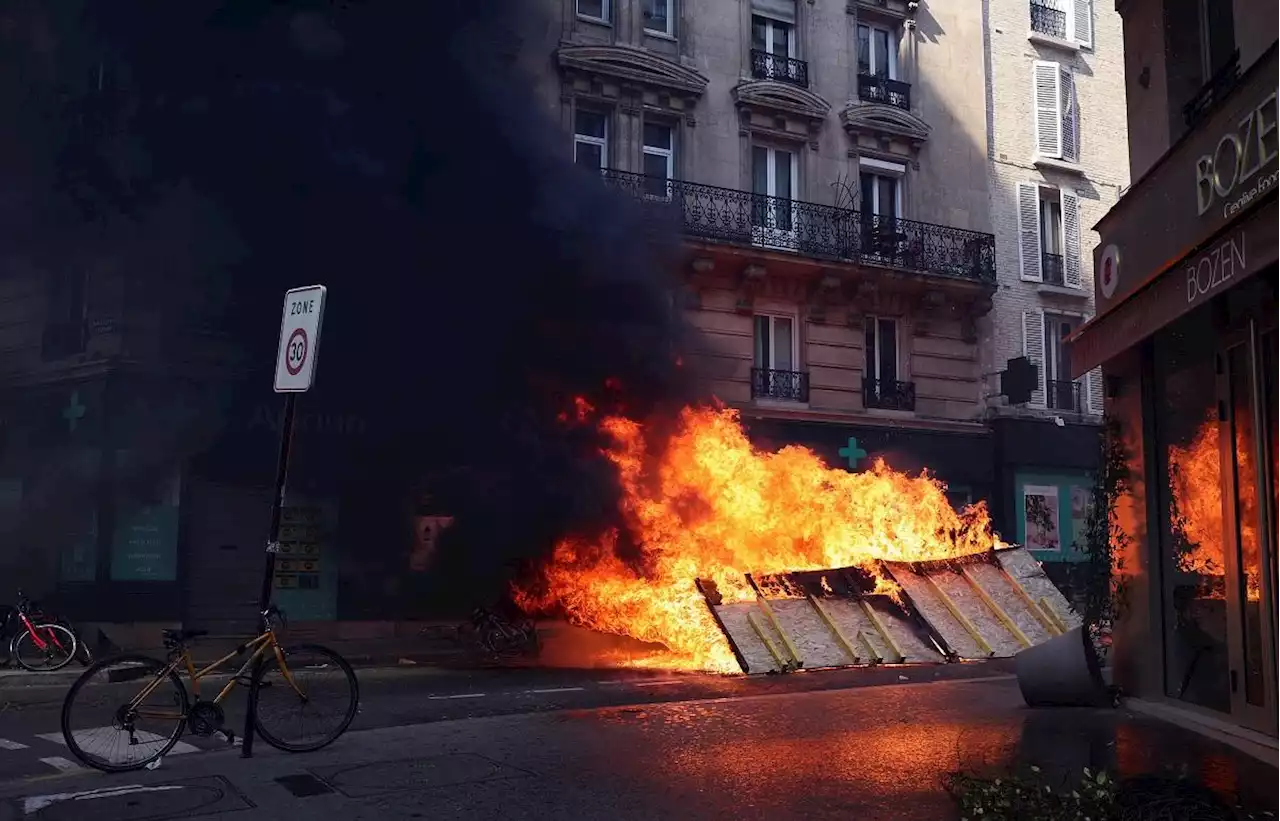 Violence erupts in May Day protests in Paris, marchers criticize re-elected Macron