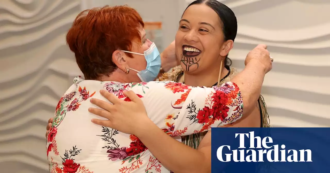 Songs, tears and reunions: New Zealand welcomes back tourists as border reopens after two years