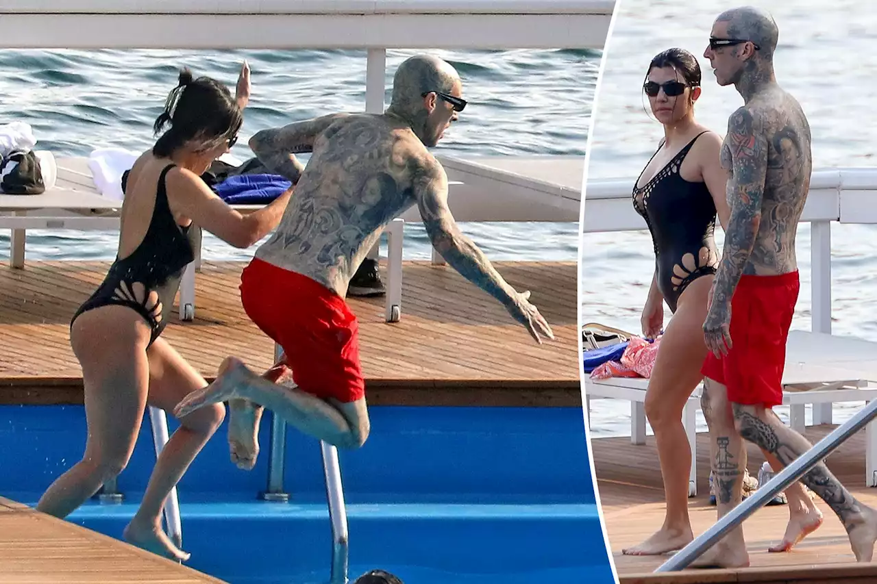 Kourtney Kardashian and Travis Barker make a splash jumping in pool together