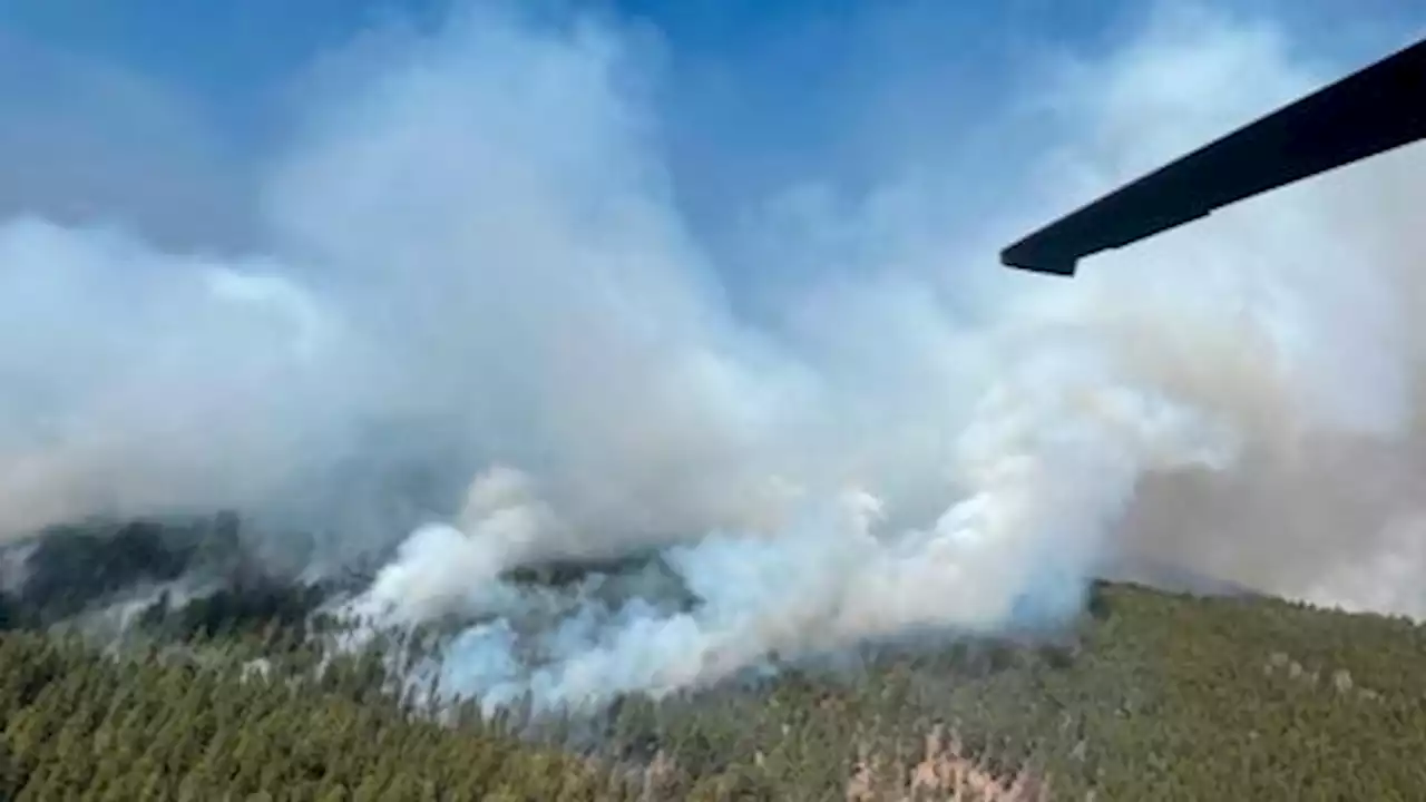 Crews engaged in 'huge firefight' as wildfire spreads in New Mexico