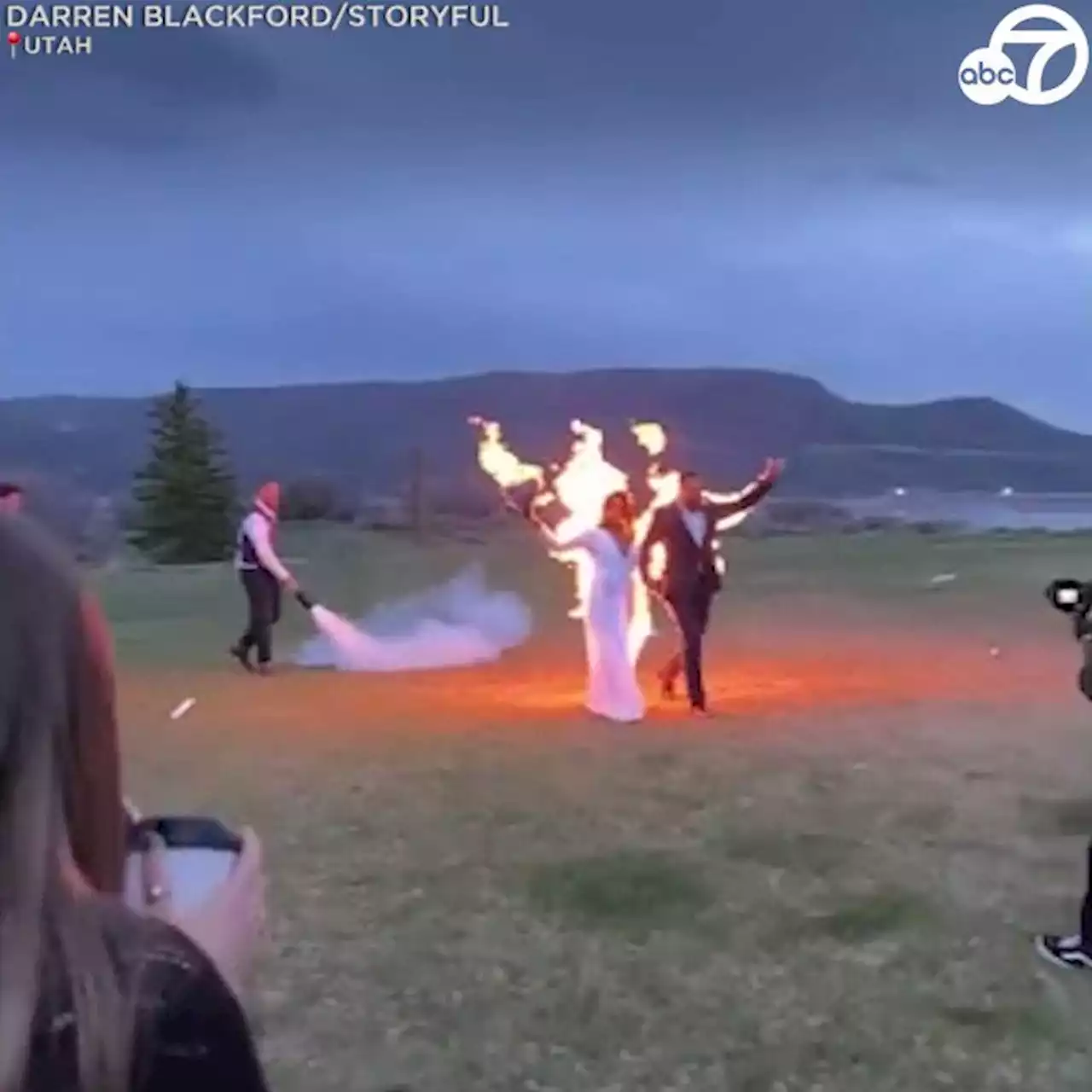 Newlyweds celebrate big day with fiery stunt