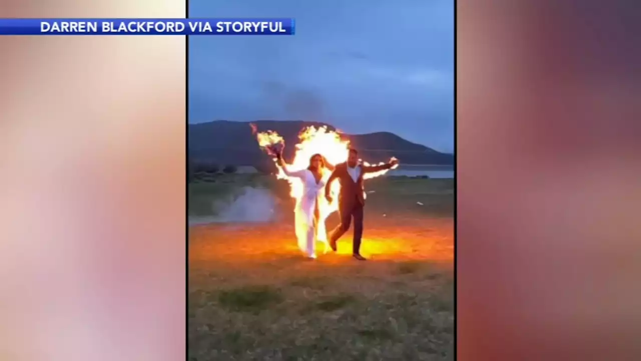 Newlyweds celebrate big day with fiery stunt