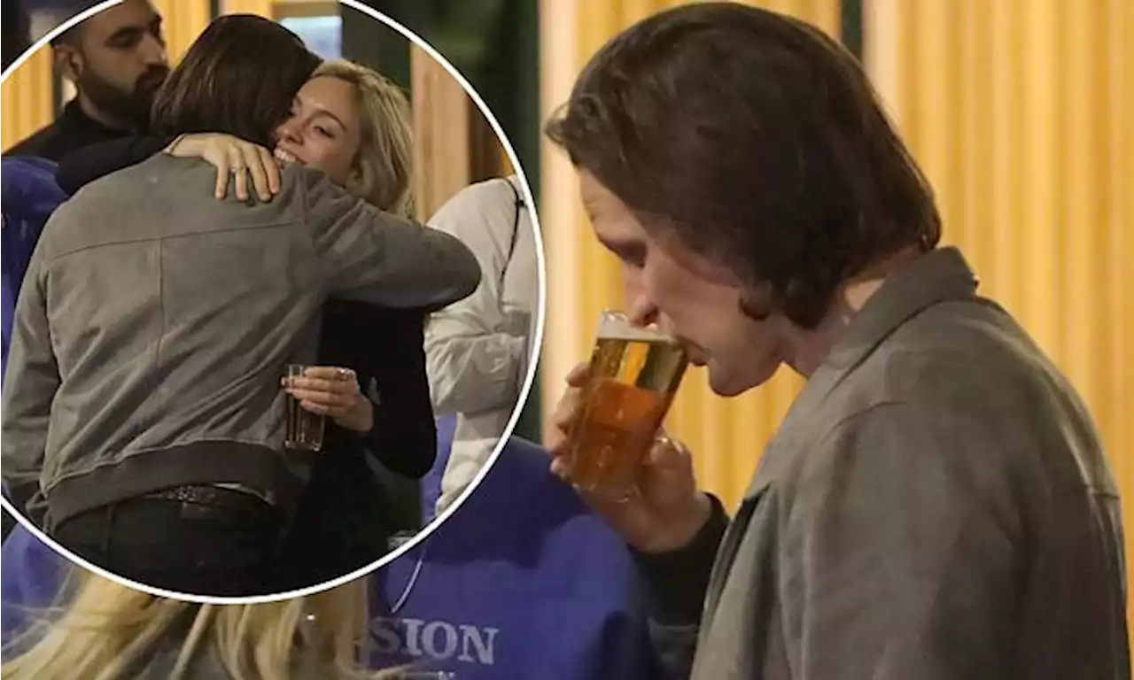 Matt Smith enjoys a boozy night out and cosies up to mystery blonde