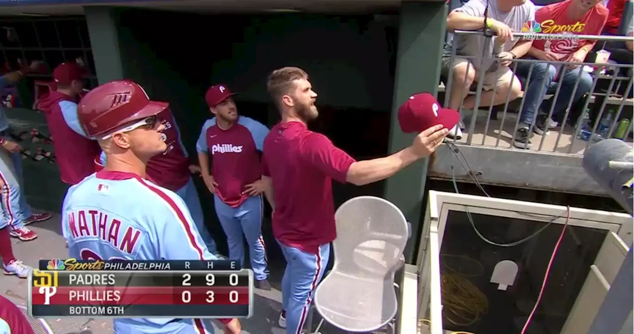 Bryce Harper hilariously made a trade for a new hat with a Phillies fan mid-game