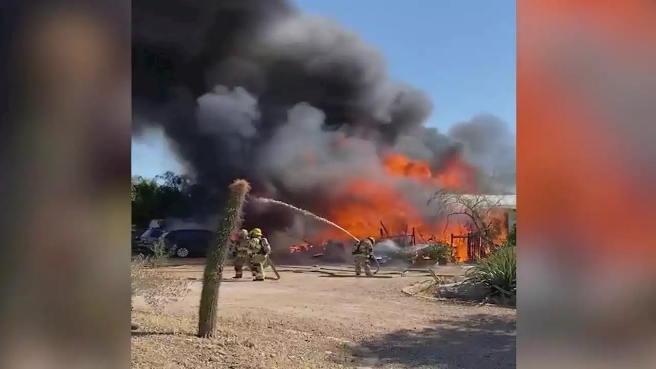 2 people burned in north Phoenix double house fire