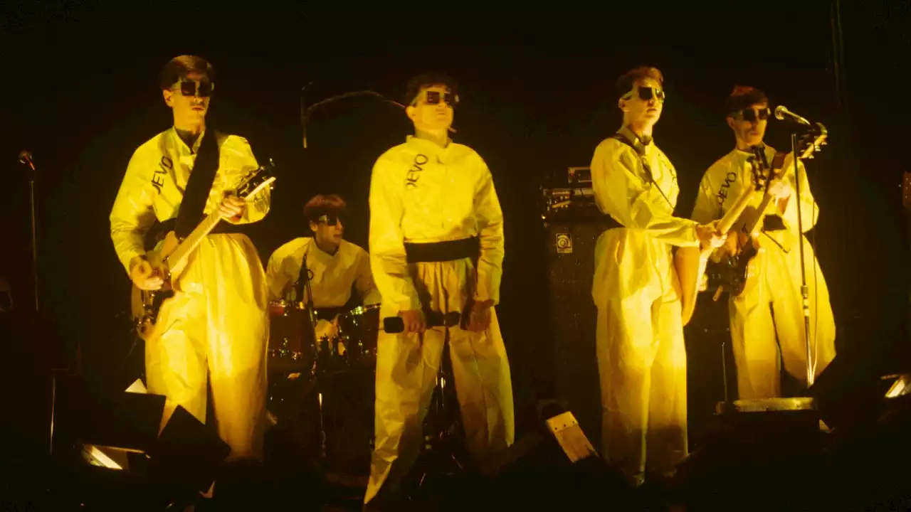 The Story Behind Devo’s Iconic Cover of the Rolling Stones’ “Satisfaction”