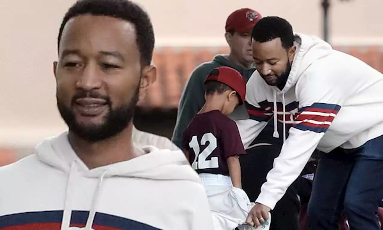 John Legend helps son Miles, four, prepare for a tee-ball game in LA