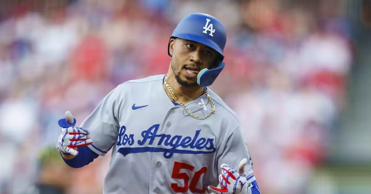 Mookie Betts puts on a show, survives a scare as streaking Dodgers beat Phillies