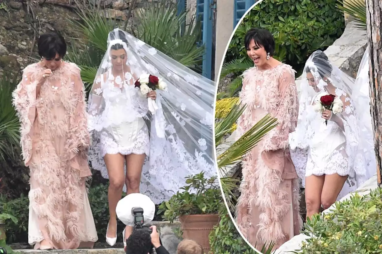 Kourtney Kardashian wears Dolce & Gabbana wedding dress to marry Travis Barker