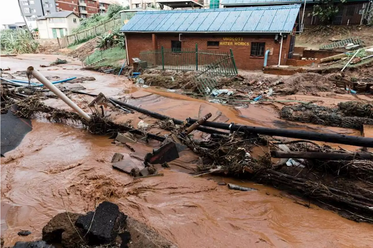 Fresh floods hit South Africa, damaging buildings