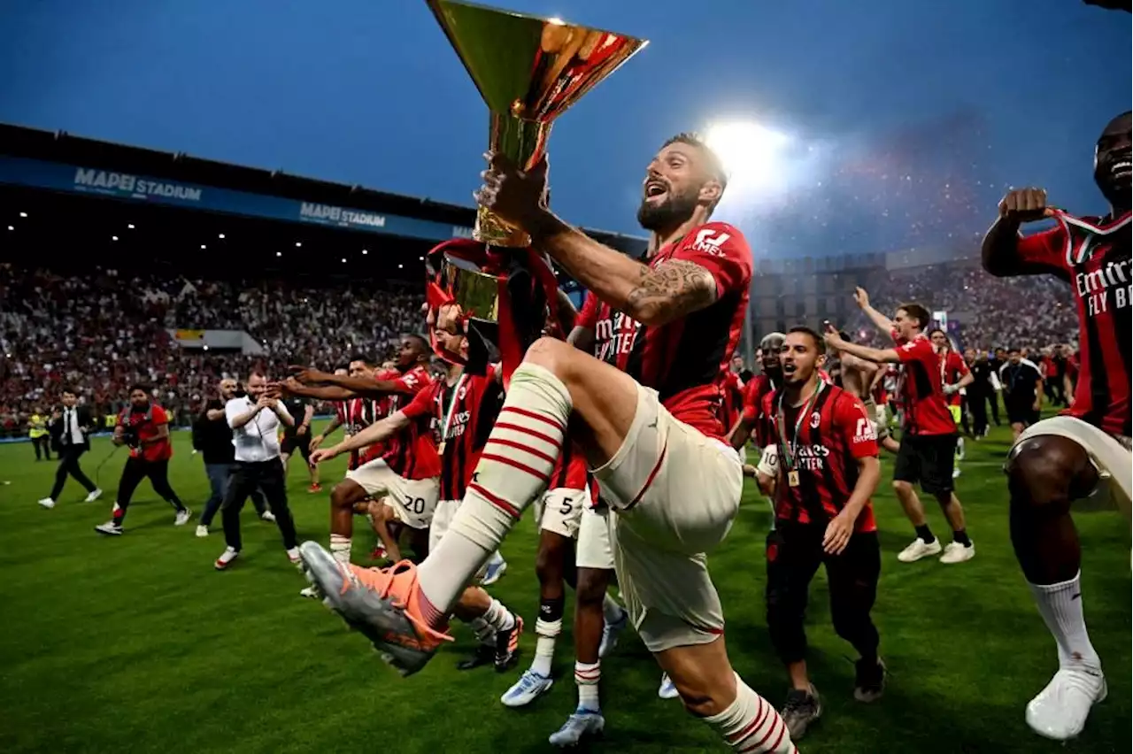 AC Milan win first Serie A title in 11 years after final-day victory at Sassuolo