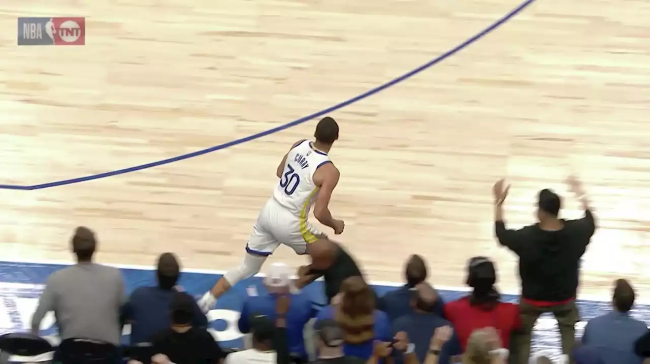 Warriors' Steph Curry trips on waiter's beer tray during Game 3