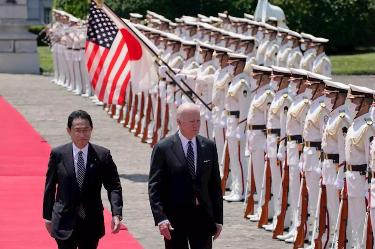 Biden reinforces Japan ties, unveils Asia trade initiative