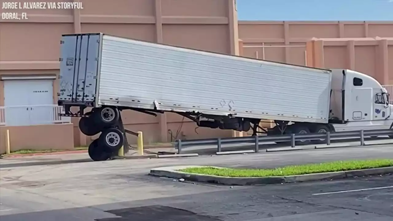 Impatient Florida truck driver loses back wheels by driving over concrete pillars