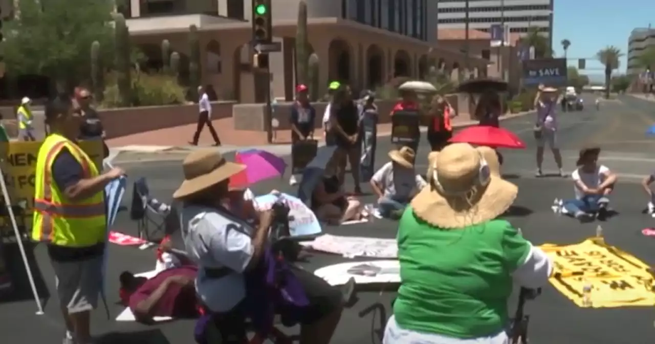 Tucson protesters gather downtown, call on Sen. Sinema to end filibuster