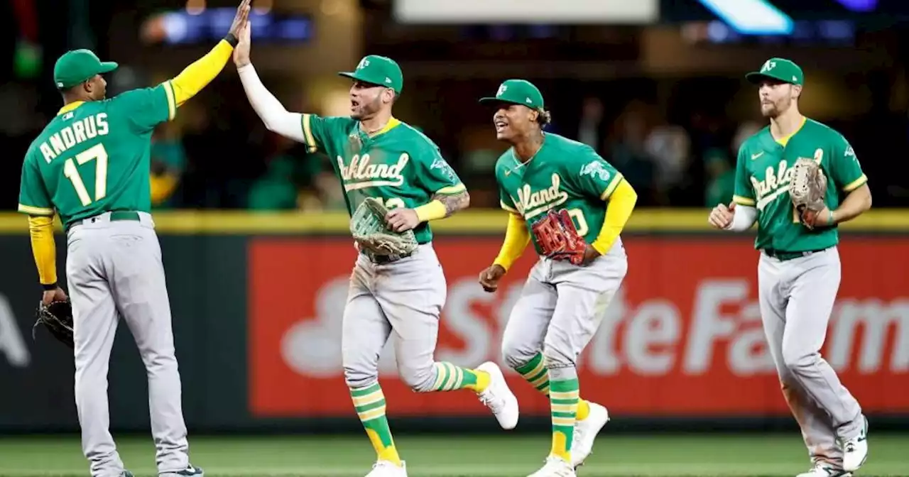 A's rally late, end 13-game skid against Mariners