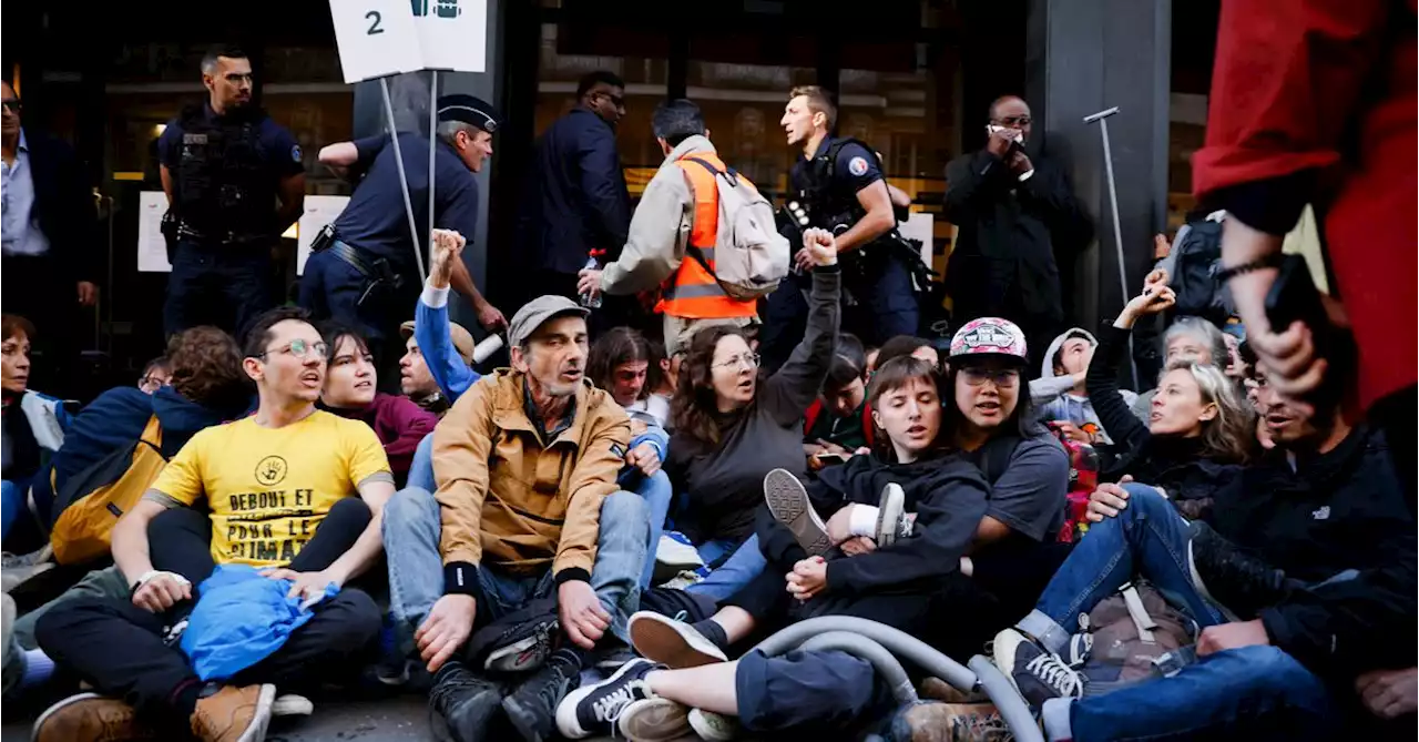 Environmental activists disrupt Paris shareholder meeting of TotalEnergies