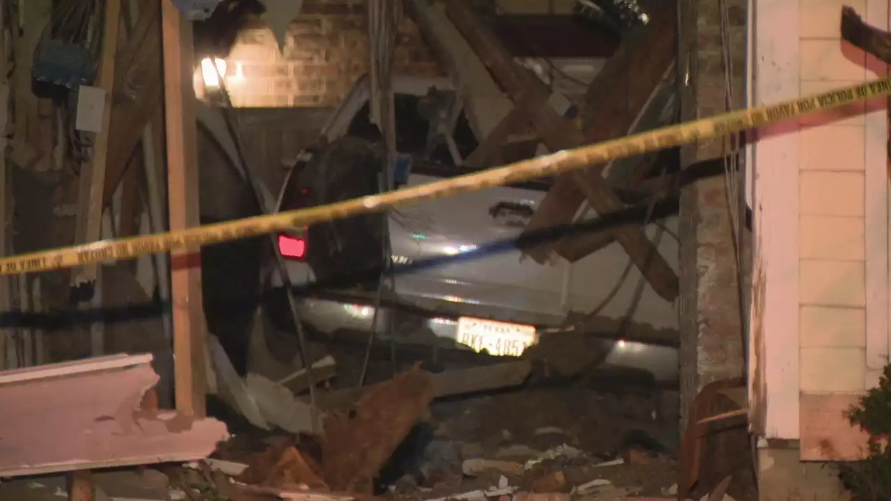 Truck plows through Dallas home, barely misses man inside