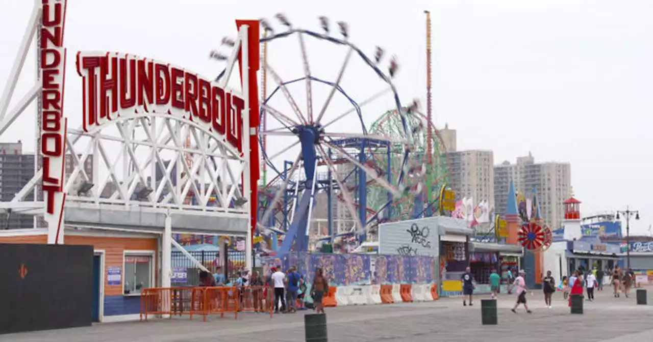 Gloomy start to Memorial Day weekend doesn't deter people visiting Coney Island