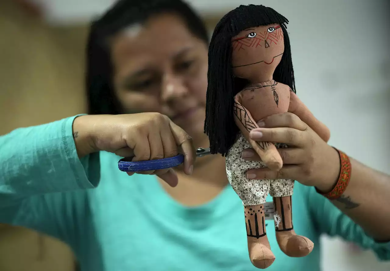 A doll brings pride, identity for Brazil Indigenous woman