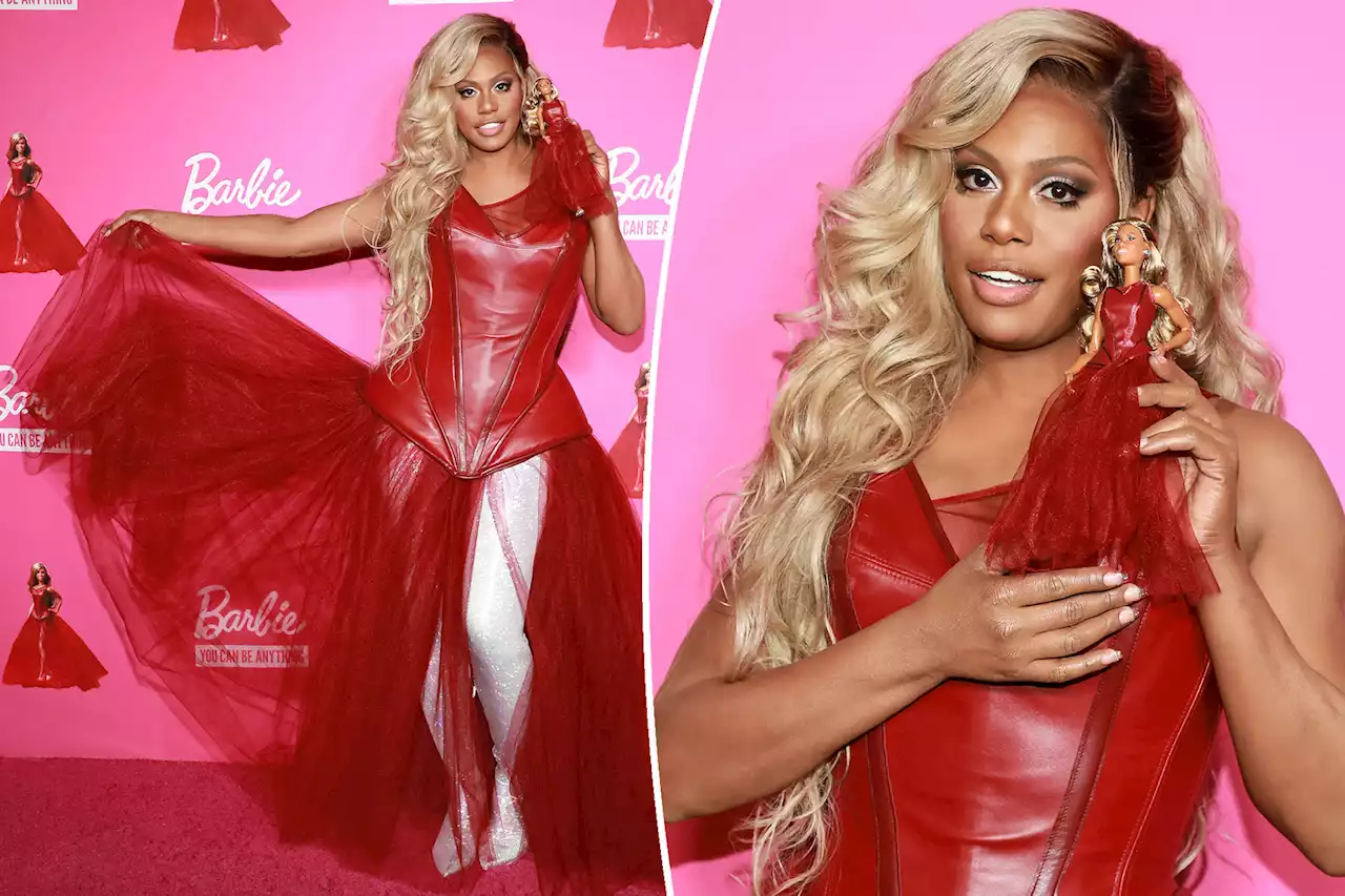 Laverne Cox twins with her Barbie doll at 50th birthday bash