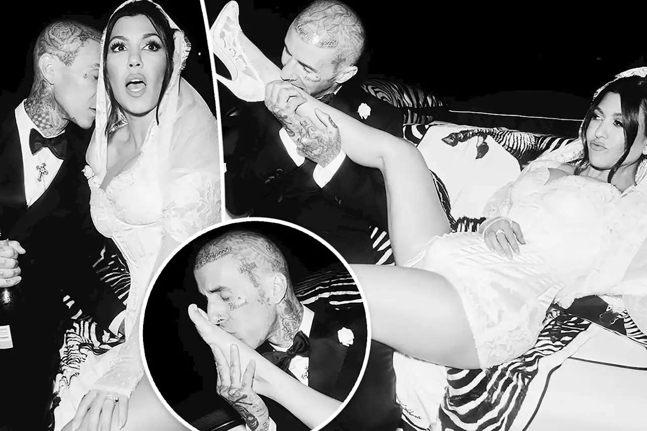 Travis Barker kisses, bites Kourtney Kardashian’s feet in new wedding pics