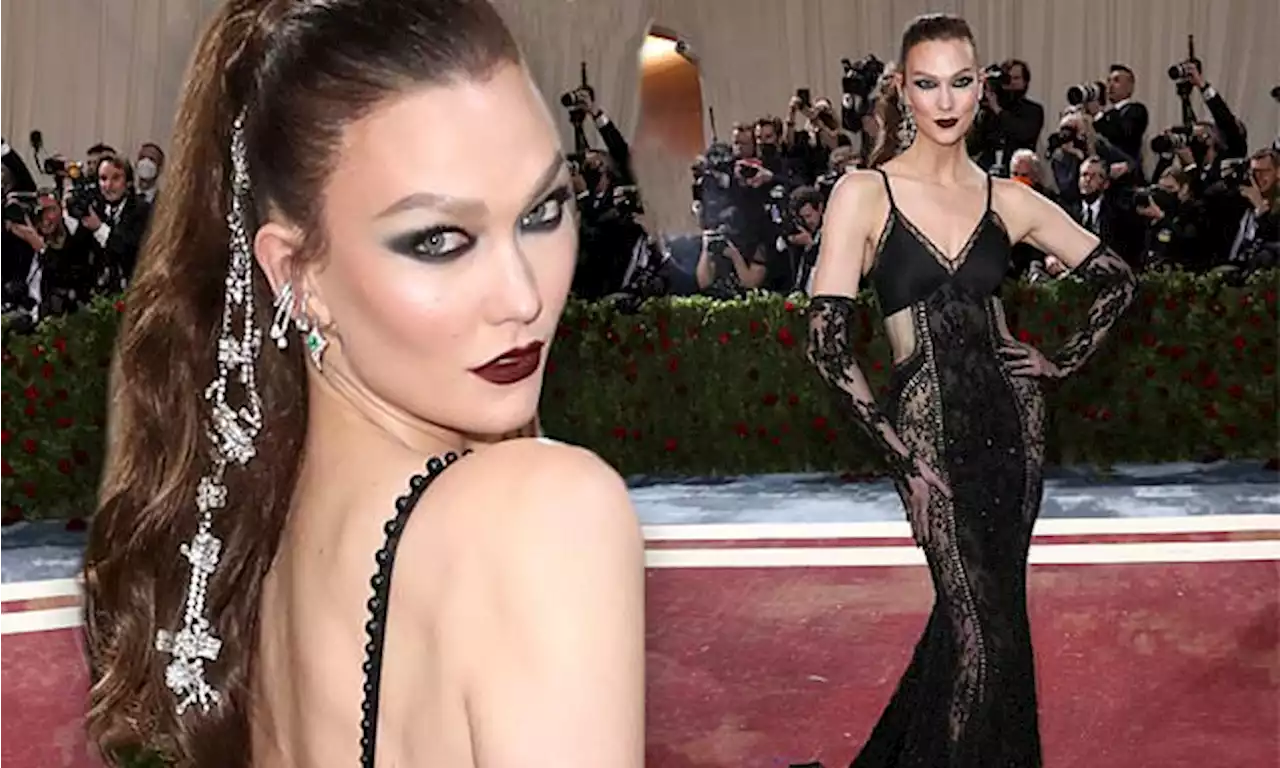 Karlie Kloss makes Met Gala arrival in figure-hugging lacy black gown