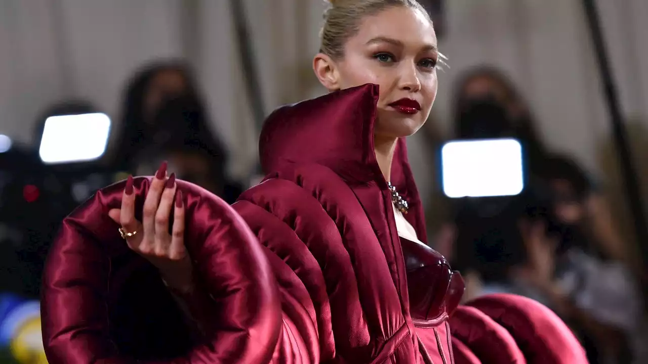 Gigi Hadid wore a bold red leather catsuit and corset to the 2022 Met Gala