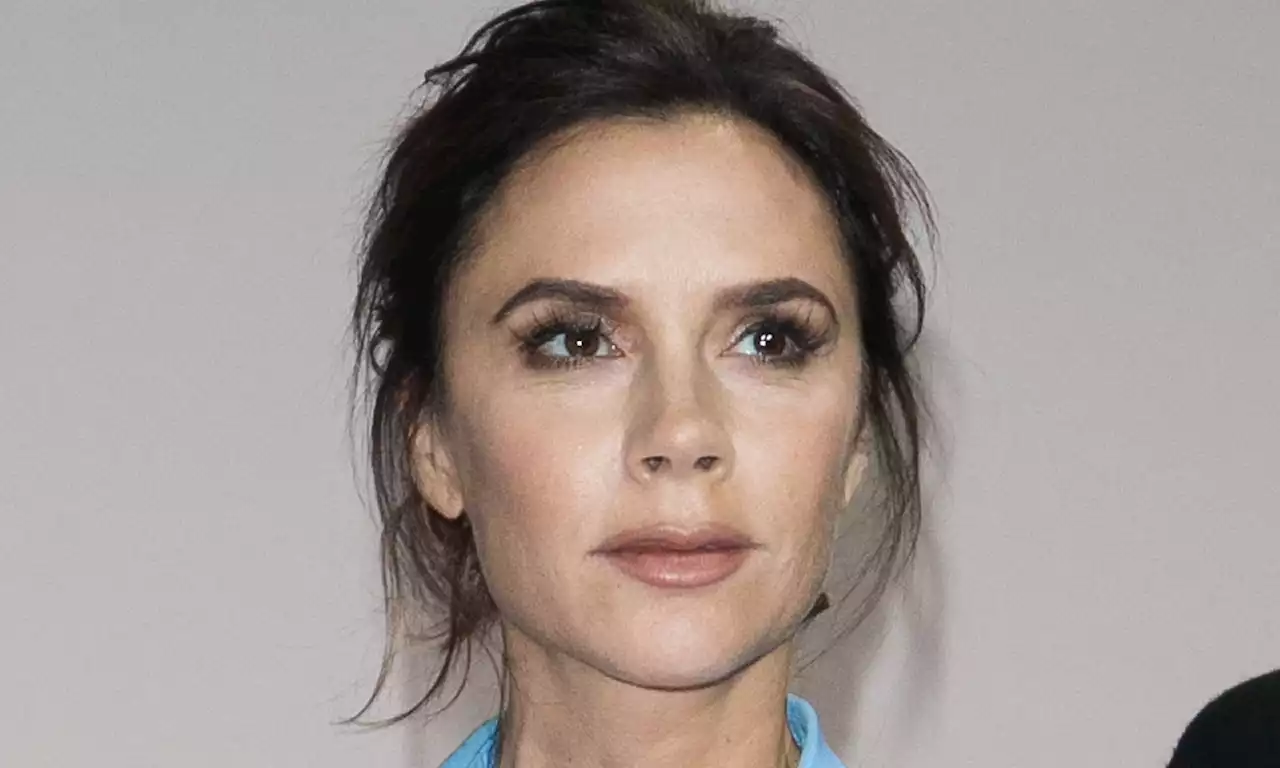 Victoria Beckham is a vision in romantic midi dress