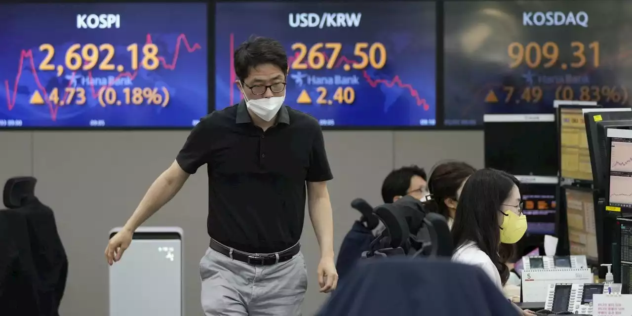 Asian markets mixed in light 'Golden Week' trading