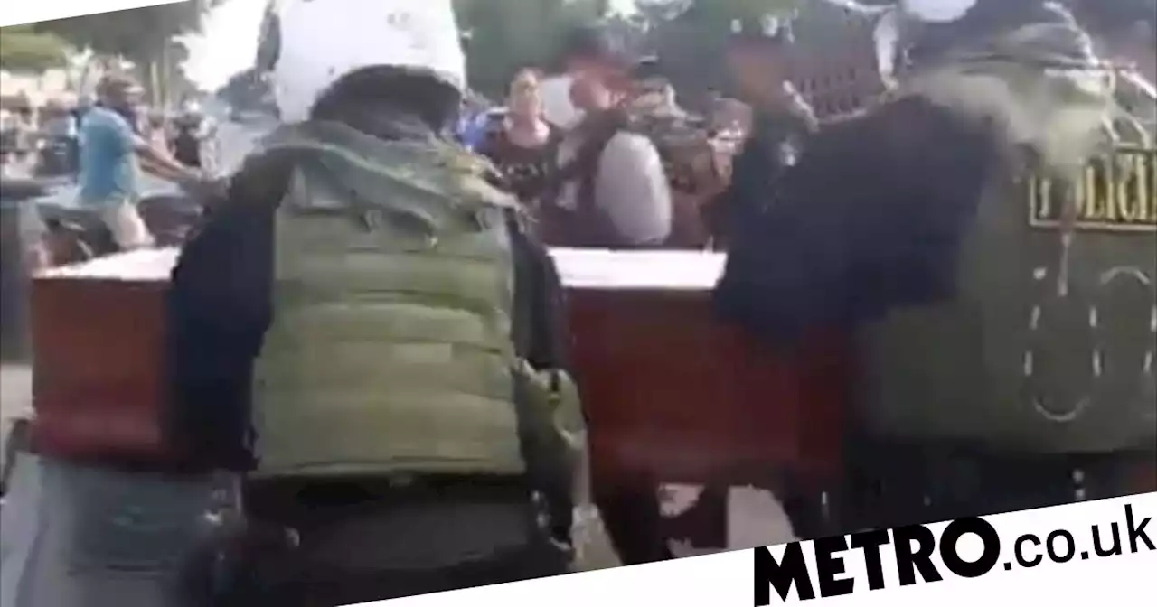 'Dead' woman bangs on coffin to say she's alive during her own funeral