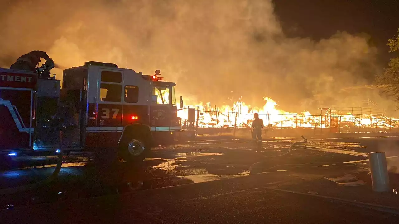 2 hurt after apartment complex under construction goes up in flames in north Phoenix