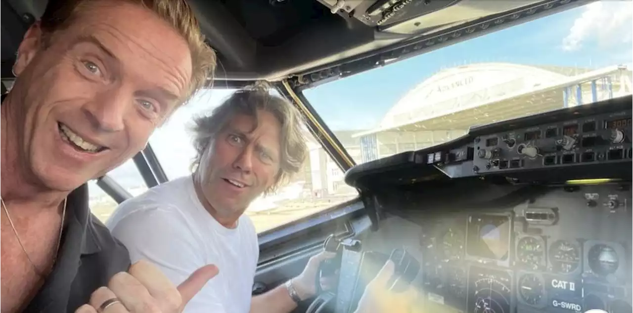 John Bishop and Damian Lewis attempt to 'fly' plane after six hours of delays