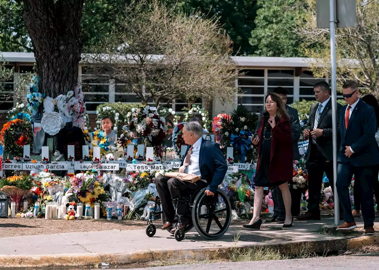 Gov. Greg Abbott greeted with boos as he visits Uvalde school memorial on Sunday