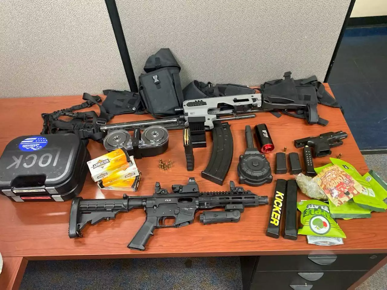 Guns, drug paraphernalia found during McMicken Ave. traffic stop