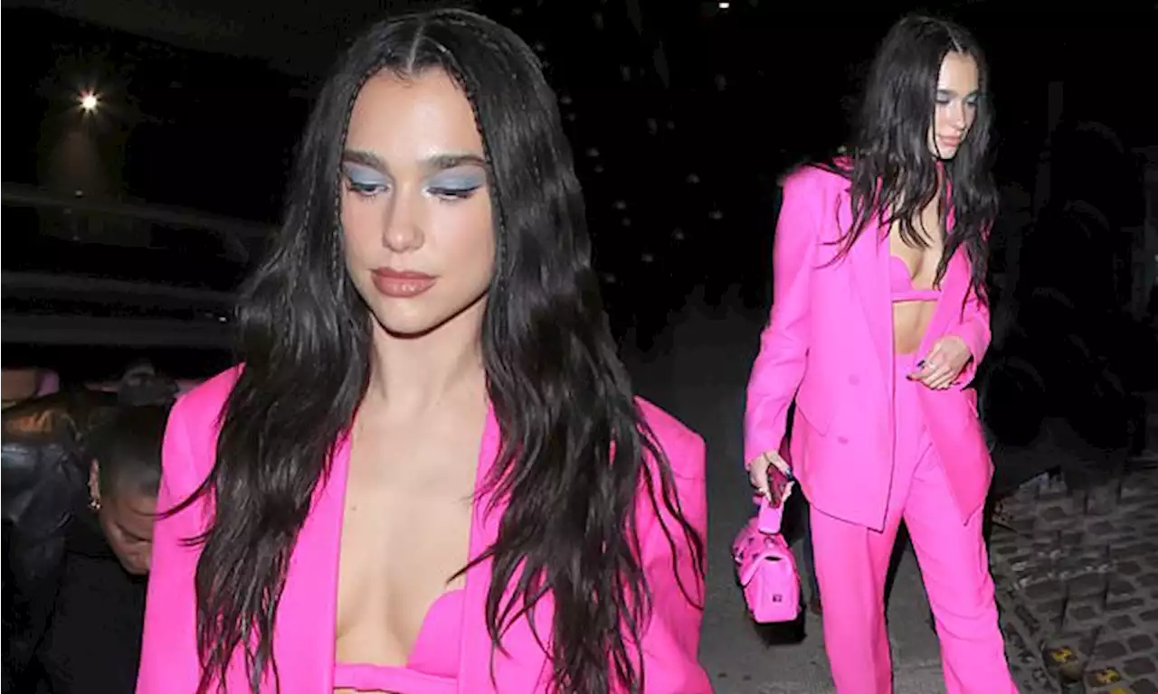 Dua Lipa wows in pink bra and suit as she parties after O2 gig