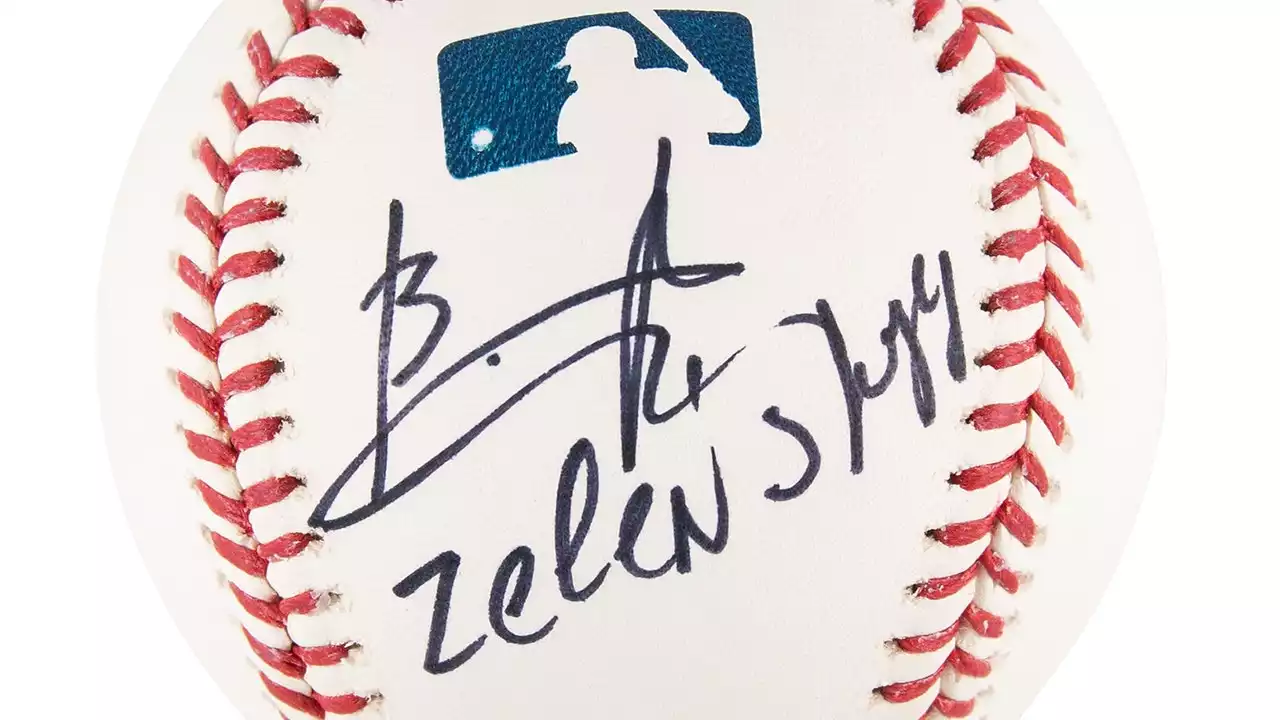 Baseball autographed by Zelenskyy to be sold at auction, proceeds go to Ukraine